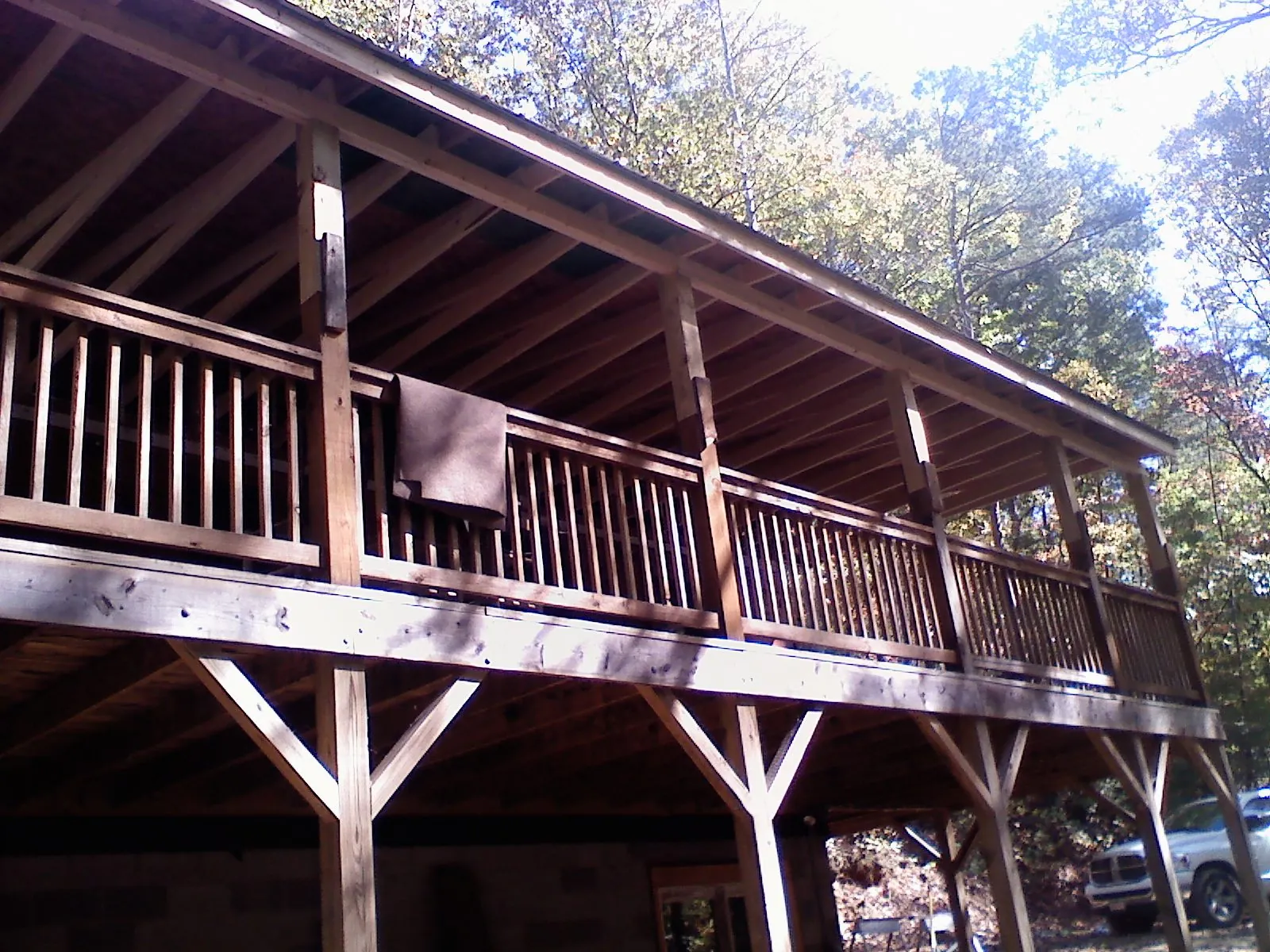 Timber framing under a new elevated porch and deck — Roof Leak Repair in Basehor by Roofing Brothers